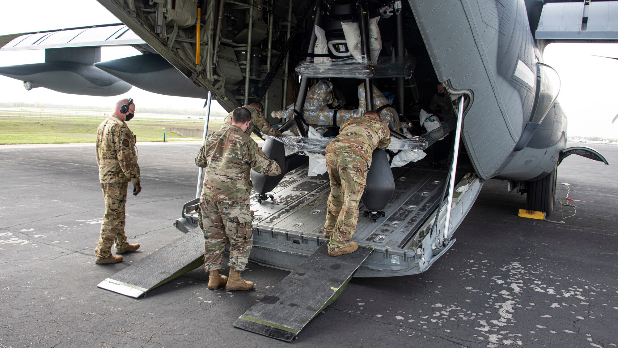 A photo of Airmen loading cargo