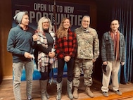 Maj. Jack Skoda, assigned to the 158th Fighter Wing, stands for a portrait with his family and daughter, Krystin, after she enlisted at the Vermont Air National Guard base