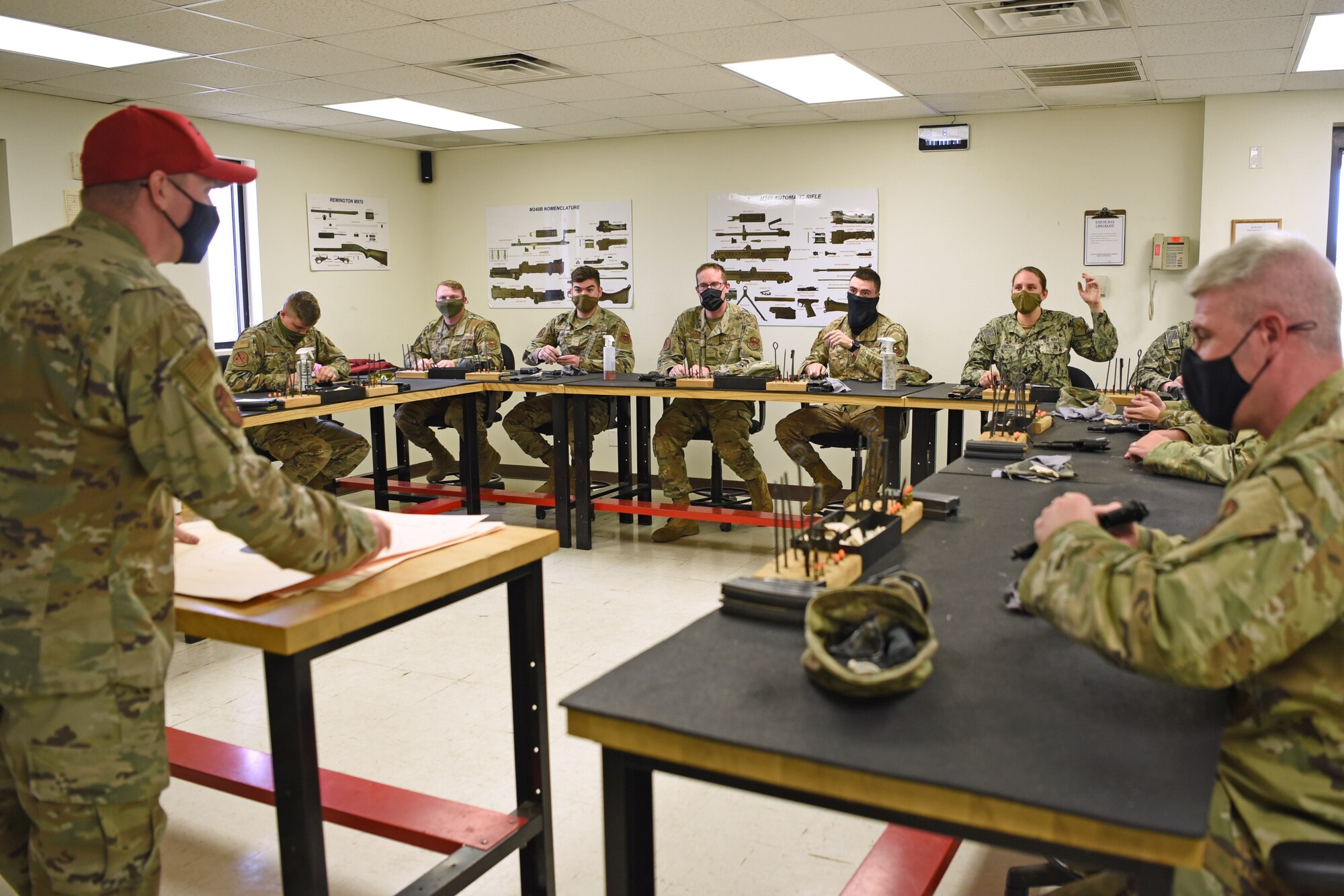 U.S. Air Force Senior Airman Sean Gardner, 17th Security Forces Squadron combat arms instructor, facilitates the Shooting in Excellence competition at the firing range, on Goodfellow Air Force Base, Texas, March 30, 2021. The competition was divided into several one-hour blocks over a two day period. (U.S. Air Force photo by Senior Airman Abbey Rieves)