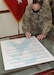 Army Reserve general signs April SAAPM proclamation at Camp Arifjan, Kuwait