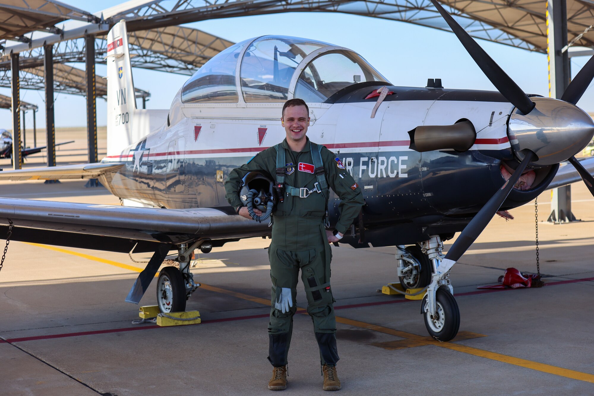 2nd Lt. Max Atkinson, 71st Student Squadron pilot in training, stands next to a T-6 Texan II at Vance Air Force Base, Oklahoma, March 31, 2021. Atkinson saved the life of a motorcyclist following a nearly fatal accident in mid-March. (U.S. Air Force/Courtesy photo)