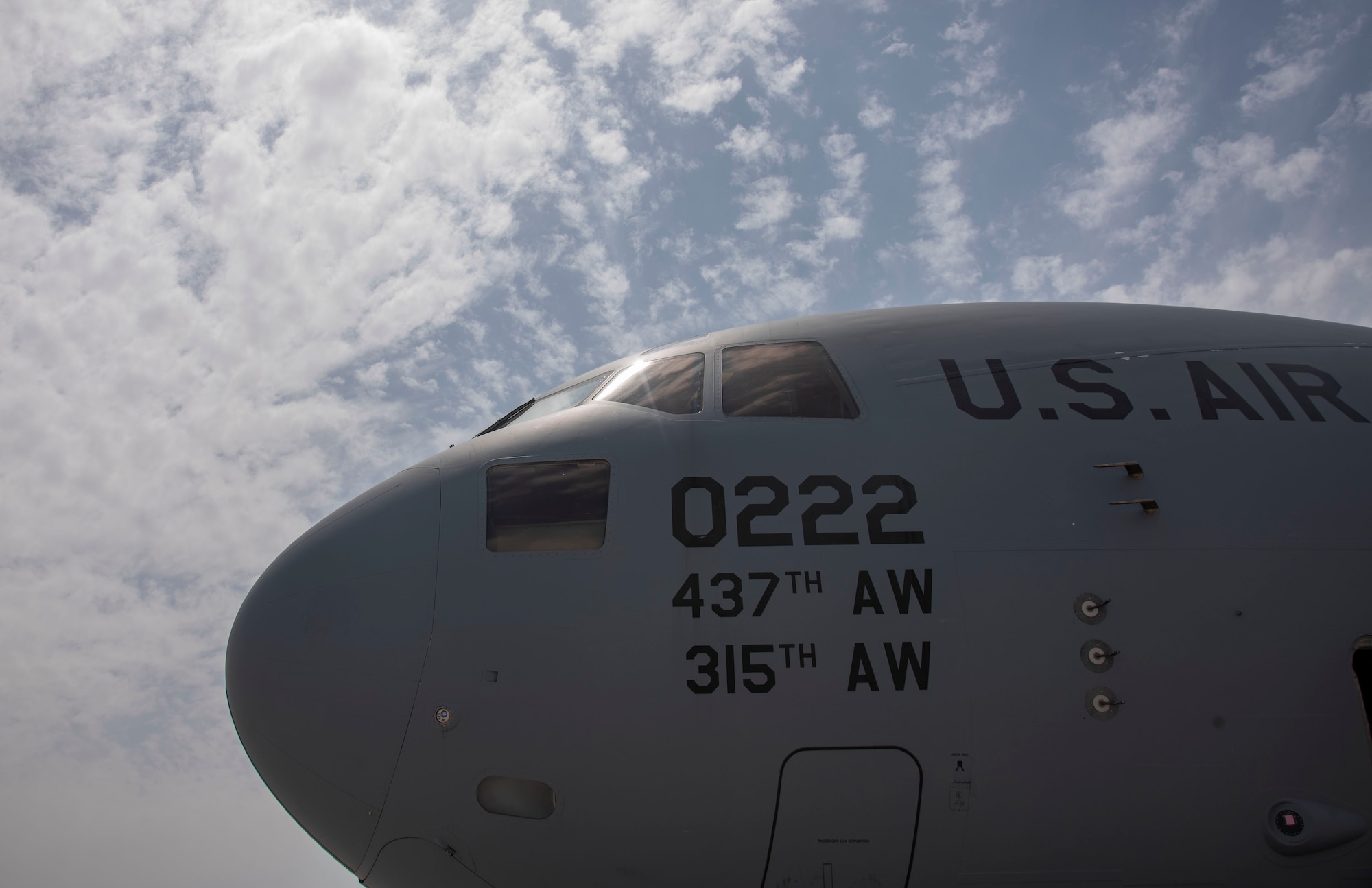 A C-17 Globemaster III assigned to Joint Base Charleston, South Carolina, parks on the flight line April 27, 2021, at Al Udeid Air Base, Qatar.