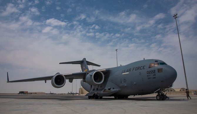 A C-17 Globemaster III assigned to Joint Base Charleston, South Carolina, parks on the flight line April 27, 2021, at Al Udeid Air Base, Qatar.