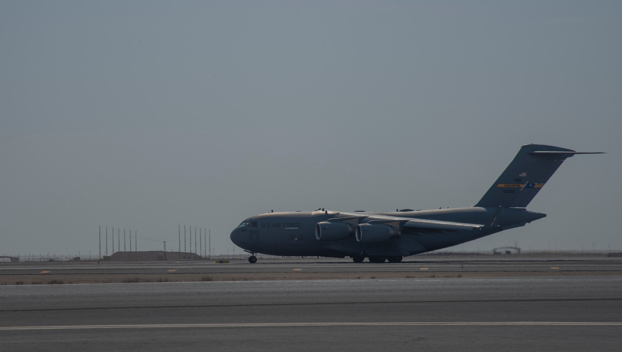 A C-17 Globemaster III assigned to Joint Base Charleston, South Carolina, prepares to takeoff on the runway April 27, 2021, at Al Udeid Air Base, Qatar.