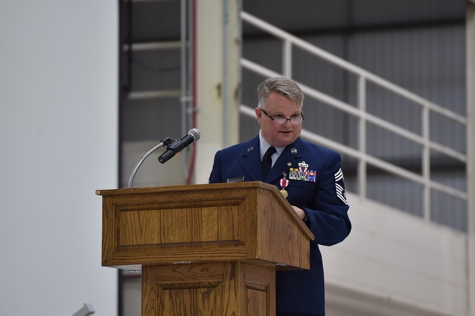 Chief Master Sgt. Chad Weisend address friends and family during his retirement ceremony held at Grissom Air Reserve Base, Ind., May 1, 2021. Weisend retired as after 36 years of service. (U.S. Air Force Photo/ Tech. Sgt. Jami K. Lancette)