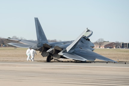 An F-22 Raptor rests on the runway after a mishap