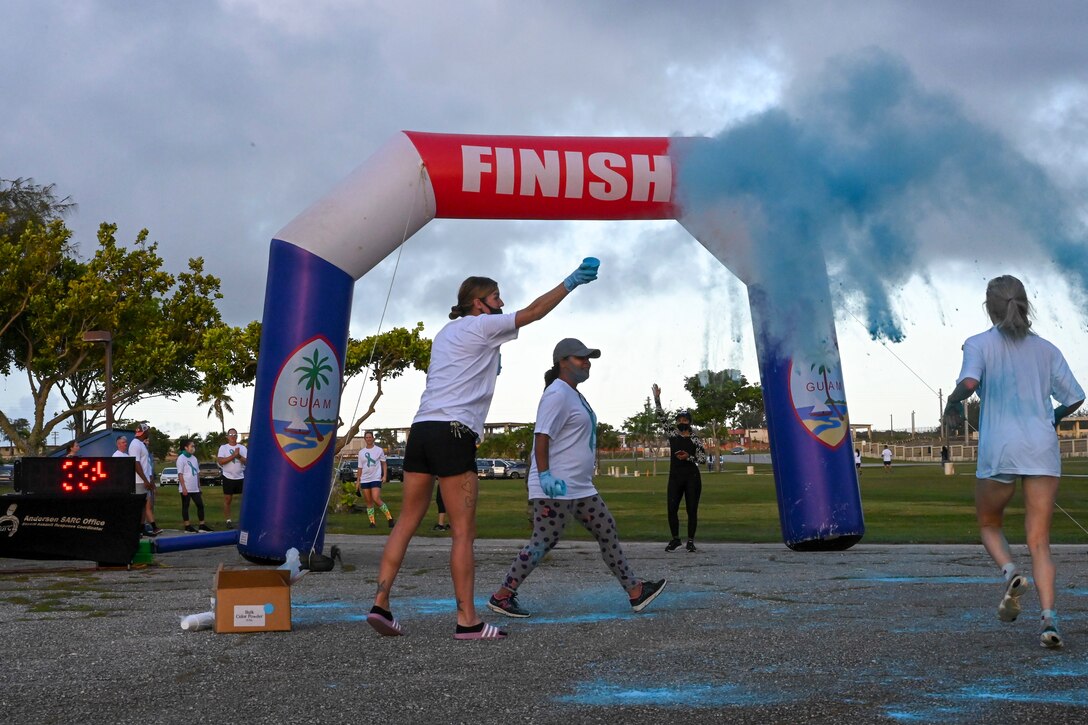 A participant runs for the finish line at the Sexual Assault Prevention & Response 5K at Andersen Air Force Base, Guam, April 30, 2021. The SAPR 5K was to educate and spread awareness of sexual assault.