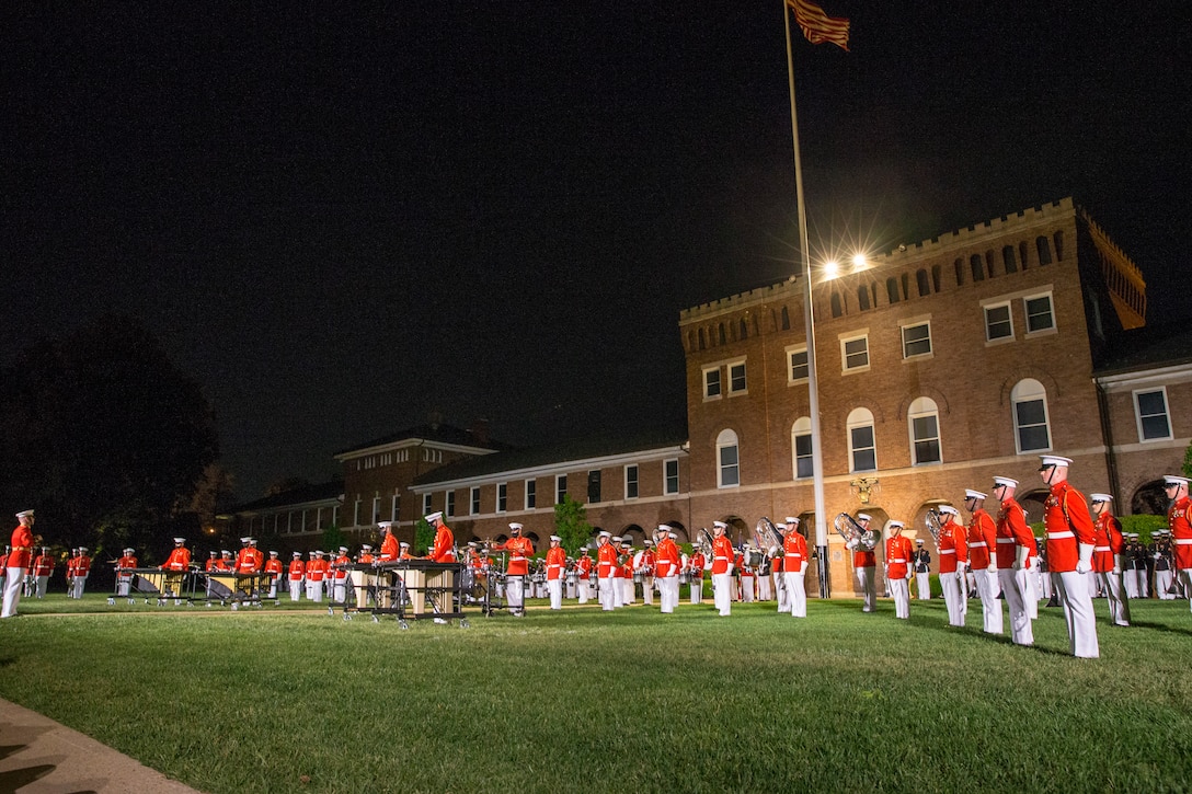Marines with “The Commandant’s Own,” U.S. Marine Drum and Bugle Corps perform during the Friday Evening Parade at Marine Barracks Washington, D.C., April 30, 2021. The Commanding Officer of Marine Barracks Washington Col. Teague A. Pastel was the hosting official, and the 38th Commandant of the Marine Corps Gen. David H. Berger was the guest of honor. (U.S. Marine Corps photo by Lance Cpl. Tanner Lambert)