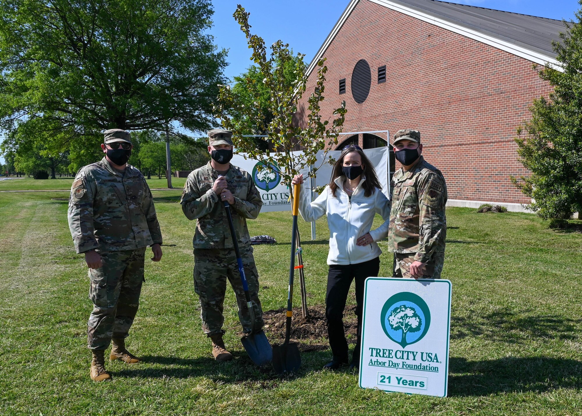 Members from the 633rd Civil Engineer Squadron pose for a photo after an Arbor Day celebration at the Bateman Library at Joint Base Langley-Eustis, Virginia, April 23, 2021.