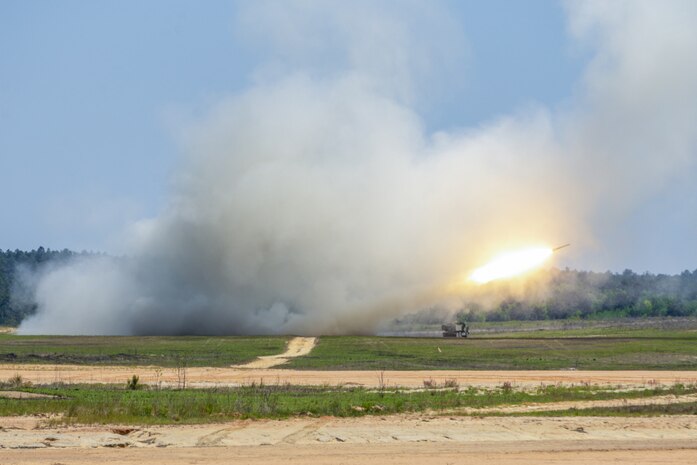 U.S. Marines with 1st Battalion, 10th Marine Regiment, 2nd Marine Division, fire a High Mobility Artillery Rocket System during Exercise Rolling Thunder 21.2 on Fort Bragg, N.C., April 26, 2021. This is a live-fire artillery exercise where 10th Marines employed distributed fires via simulated Expeditionary Advanced Bases. The training increased 2nd MARDIV’s combat readiness against a peer competitor. HIMARS are an advanced long-range and mobile rocket system that allows 2nd MARDIV to employ precision fires onto a target.