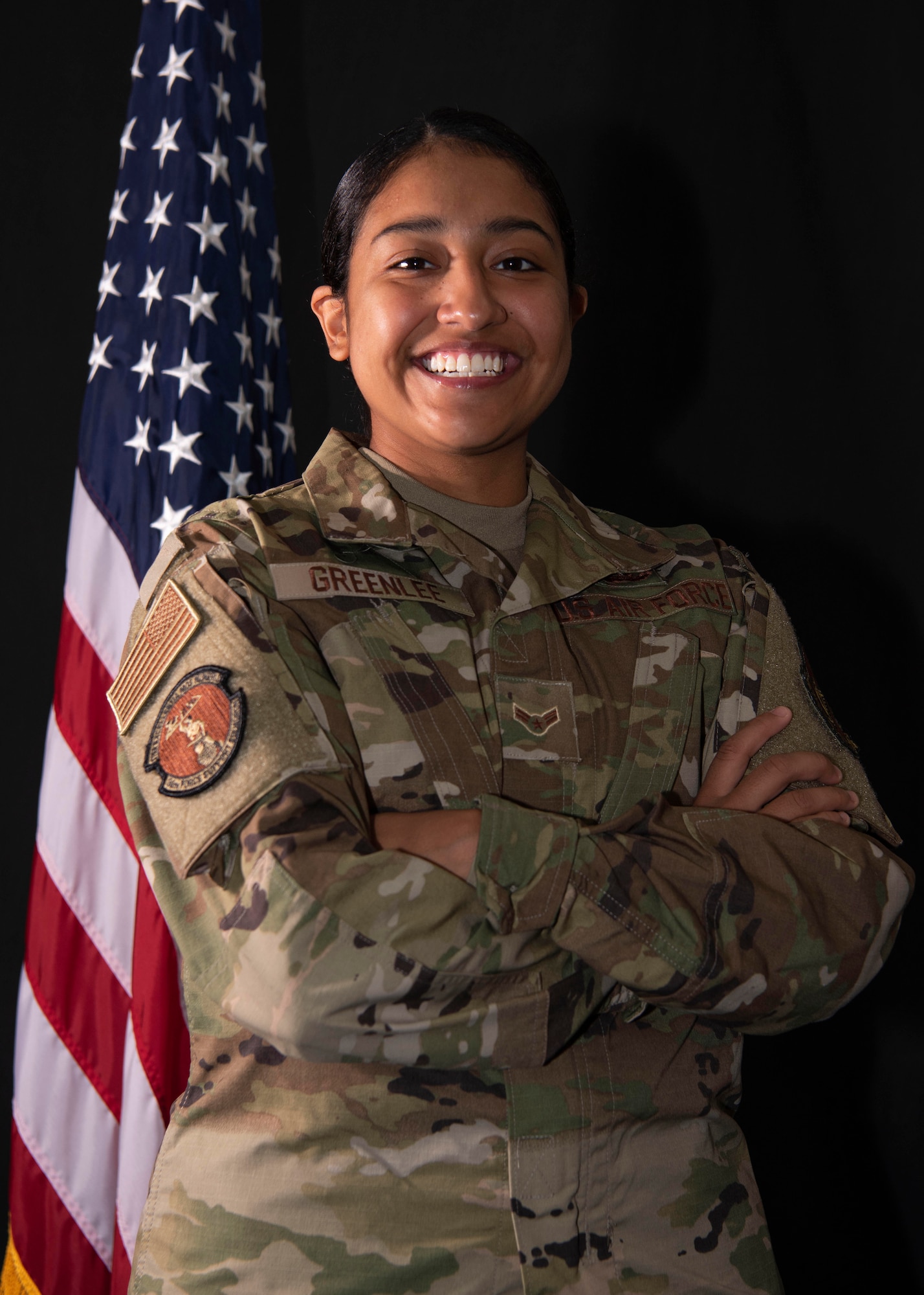Airman 1st Class Jessica Makenna Martinez Greenlee, 36th Force Support Squadron services journeyman, poses for a portrait at Andersen Air Force Base, Guam, May 3, 2021. Although Greenlee’s childhood with 29 siblings was not the most conventional, it crafted her into the resilient woman and Airman she is today. (U.S. Air Force photo by Senior Airman Aubree Owens)