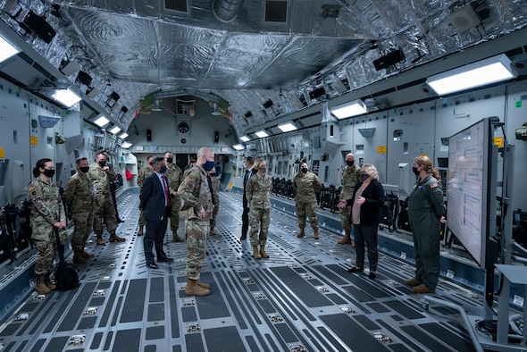 Elizabeth Miller, En Route Care Training Department Deputy Chair at the USAF School of Aerospace Medicine, speaks to Gen. David Allvin, Air Force Vice Chief of Staff in a C-17 trainer during his visit to AFRL's 711th Human Performance Wing Apr. 26, 2021 at Wright-Patterson Air Force Base, Ohio. Allvin was briefed on Ready Medics and Aeromedical Evacuation training. (U.S. Air Force photo/Richard Eldridge)