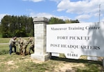Virginia National Guard Soldiers and civilian employees of Maneuver Training Center Fort Pickett plant two trees at the MTC garrison headquarters in honor of Earth Day April 22, 2021, at Fort Pickett, Virginia.