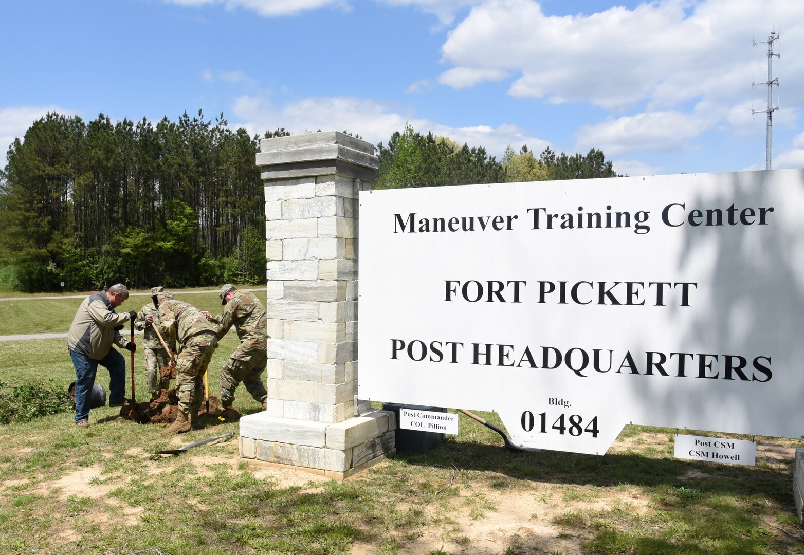 Virginia National Guard Soldiers and civilian employees of Maneuver Training Center Fort Pickett plant two trees at the MTC garrison headquarters in honor of Earth Day April 22, 2021, at Fort Pickett, Virginia.