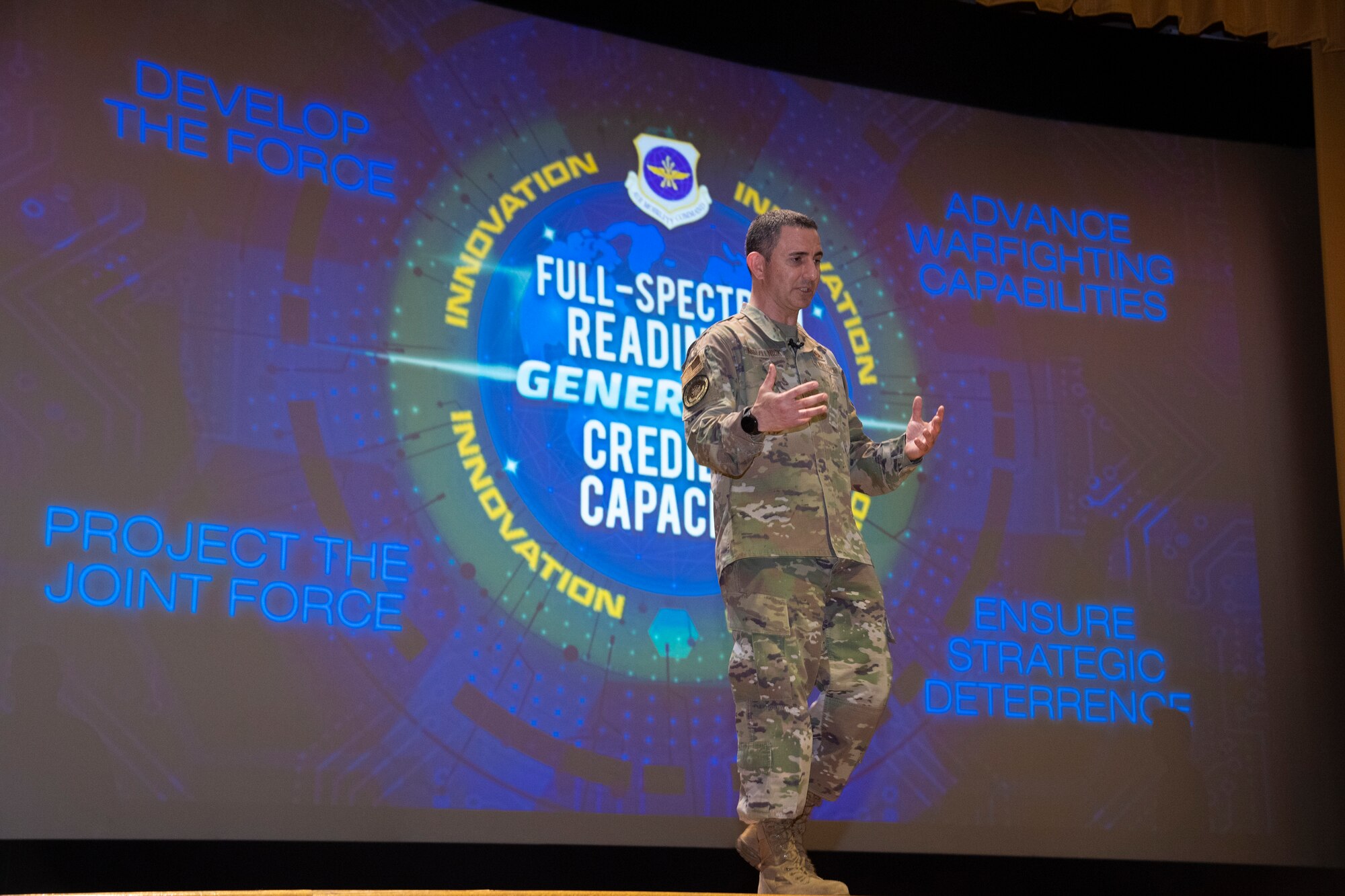 Chief Master Sgt. Brian Kruzelnick, the Air Mobility Command (AMC) command chief, speaks during a commander’s call at MacDill Air Force Base, Fla., April 28, 2021.