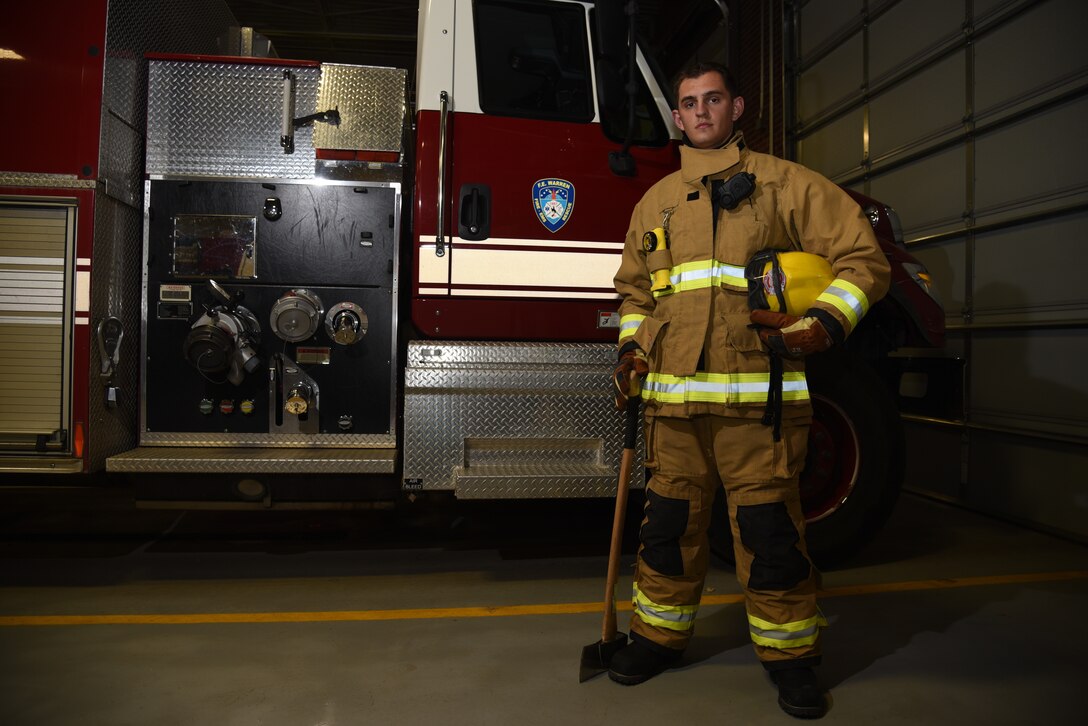 A1C Zachery Ravlin poses for a photo