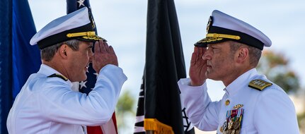 JOINT BASE PEARL HARBOR-HICKAM (April 29, 2021) -- Rear Adm. Blake Converse, from Montoursville, Pennsylvania, salutes Rear Adm. Jeffrey Jablon, from Frostburg, Maryland, during a change of command ceremony for Commander, Submarine Force, U.S. Pacific Fleet, held on the brow of the Virginia-class fast-attack submarine USS North Carolina (SSN 777). Jablon relieved Converse as the 43rd commander, Submarine Force, U.S. Pacific Fleet, at the ceremony held on the historic submarine piers on Joint Base Pearl Harbor-Hickam. (U.S. Navy photo by MC1 Michael B. Zingaro/Released)