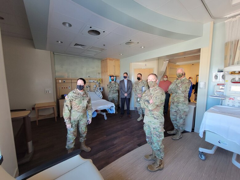 Weed Army Community Hospital’s commander Col. Nancy Parson, left, briefs U.S. Army Corps of Engineers Deputy Commanding General for Military and International Operations Maj. Gen. Jeffrey L. Milhorn, center, and U.S. Army Corps of Engineers South Pacific Division Commander Brig. Gen. Paul Owen, right, about the Mother-Baby unit, which features labor and delivery, recovery and postpartum rooms, one C-Section suite and a nursery during an April 26 tour of the hospital.
