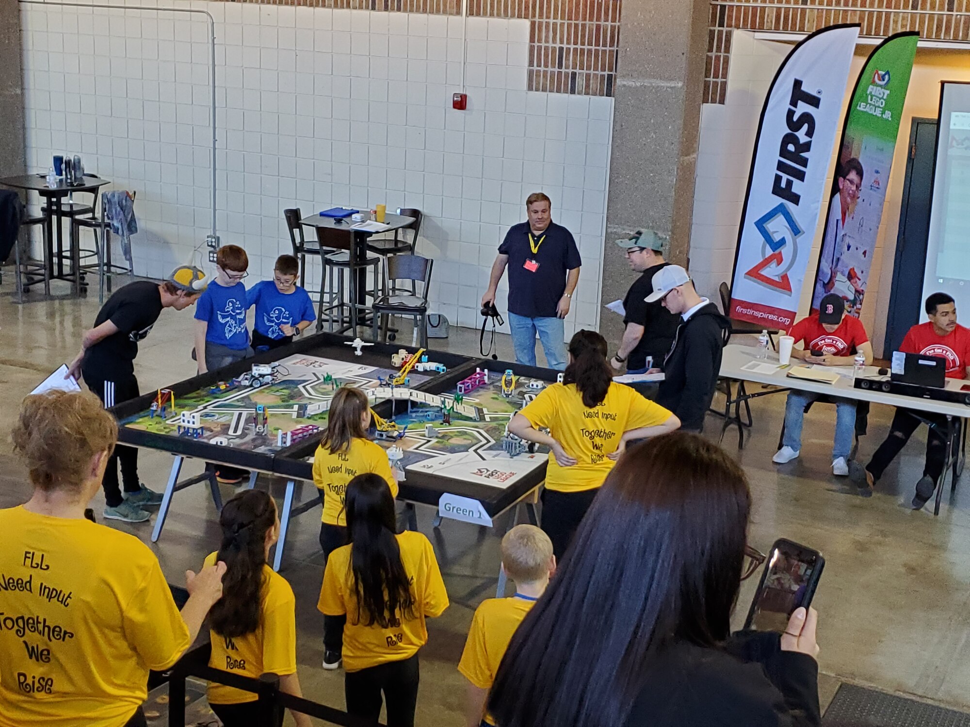 Two FIRST® LEGO® League teams compete at the Alamogordo FLL qualifying event, which was hosted in collaboration between the 704th Test Group at Holloman Air Force Base, N.M., and Alamogordo Public Schools. Heather Kangas, 704th Test Group K-12 STEM Outreach coordinator, is involved in local the FLL program. In her role, Kangas works to expose elementary, middle and high school students in the Alamogordo Public Schools system to science, technology, engineering and math, or STEM, concepts. The 704th at Holloman AFB is a unit of the Arnold Engineering Development Complex, headquartered at Arnold Air Force Base, Tennessee. This photo was taken prior to the COVID-19 pandemic. (Courtesy photo)