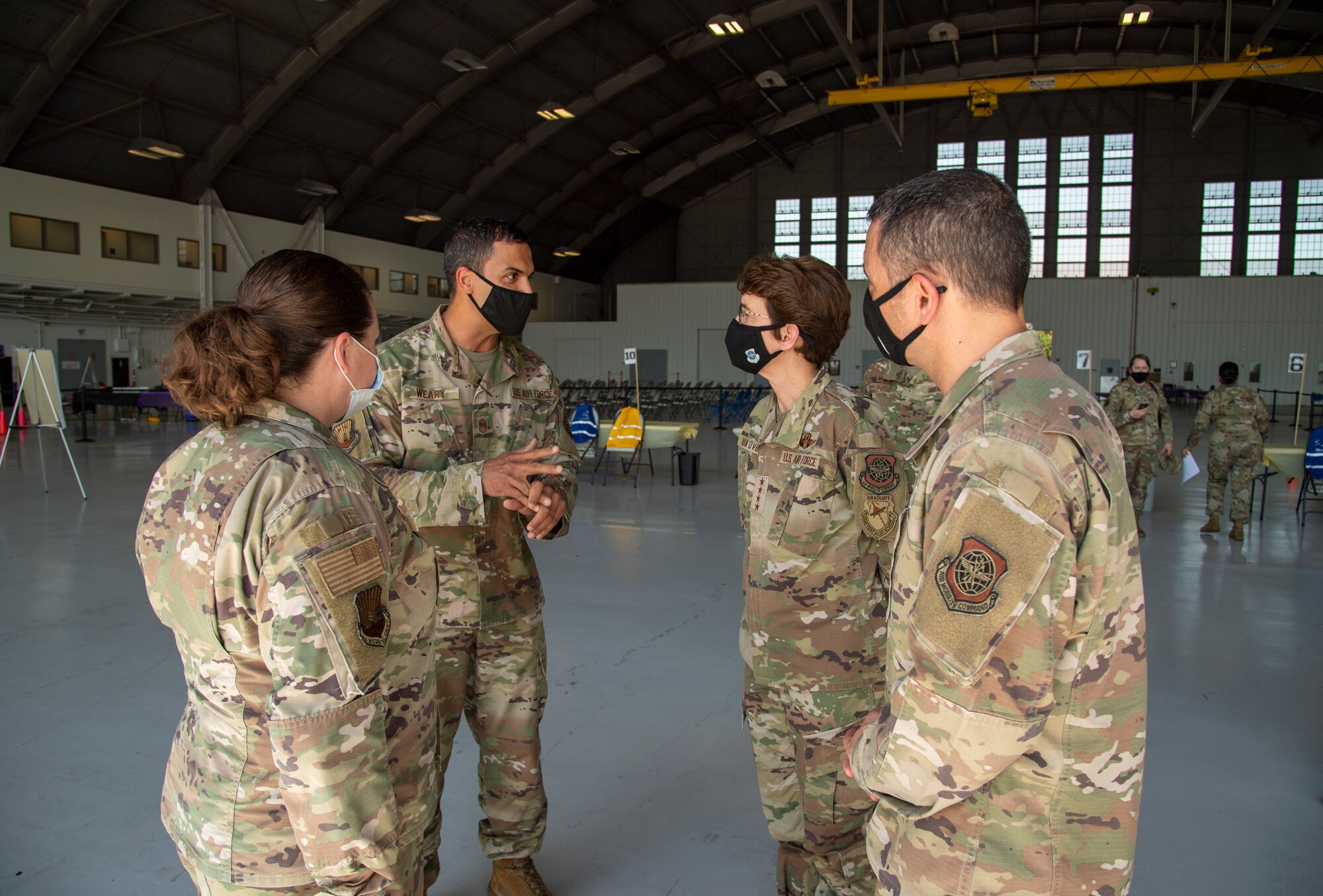 Air Mobility Command (AMC) Commander, Gen. Jaqueline Van Ovost, and AMC Command Chief, Chief Master Sgt. Brian Kruzelnick, speak to Airmen from the 6th Medical Group during their visit to MacDill Air Force Base, Fla., April 28, 2021.