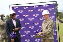(Left) Mr. Greg White, chief executive of the LEARN network, and U.S. Air Force Maj. Gen. Ricky Rupp, Air Force District of Washington commander, share a laugh at the LEARN ground breaking ceremony at Joint Base Anacostia-Bolling, Washington D.C., April 29, 2021. LEARN D.C. is a new public charter school located on JBAB and open to all D.C. children in Fall 2021.