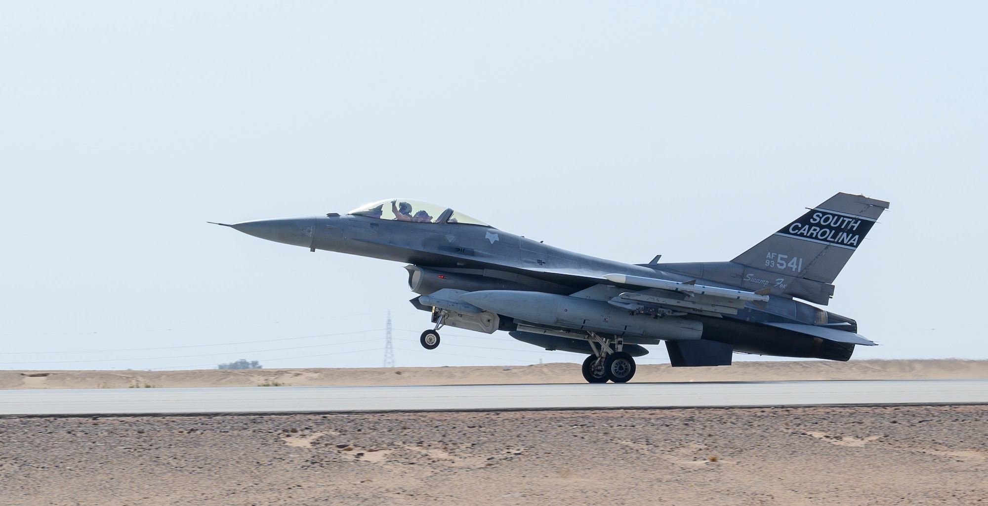 A U.S. Air Force F-16CJ Fighting Falcon from South Carolina Air National Guard’s 169th “Swamp Fox” Fighter Wing lands on the flight line at Prince Sultan Air Base, Kingdom of Saudi Arabia, April 14, 2021. The Swamp Fox team has been deployed to PSAB to help bolster the defensive capabilities against potential threats in the region. (U.S. Air Force Photo by Senior Airman Samuel Earick)