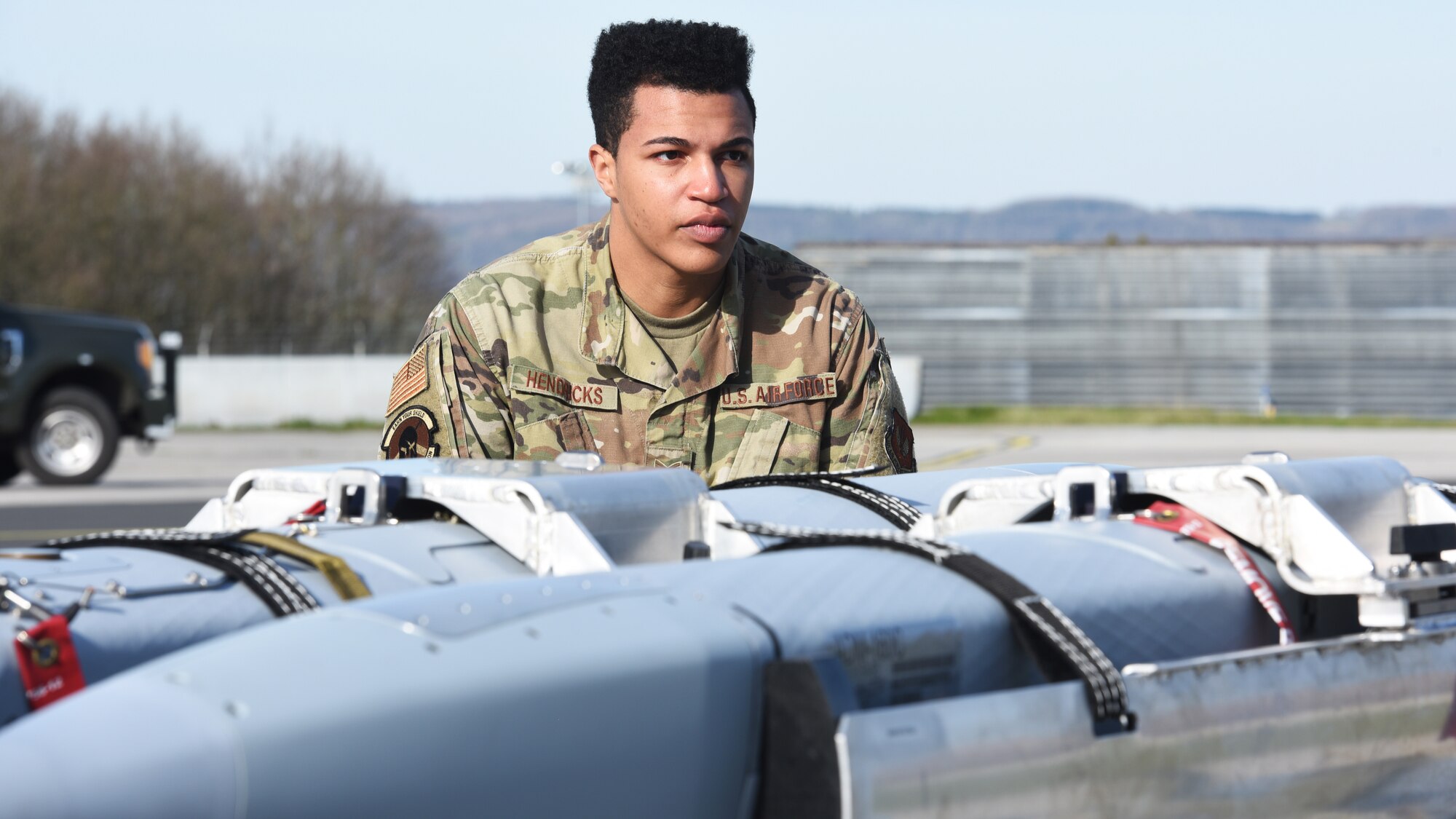 U.S. Air Force Staff Sgt. Winston Hendricks, 52nd Maintenance Squadron Precision Guided Munitions Crew Chief, assists with prepping a number of munitions for a U.S. Air Force F-16 Fighting Falcon during an exercise at Spangdahlem Air Base, Germany, April 27, 2021. In all, Airmen would load one AGM-158 Joint Air to Surface Standoff Missile and two ADM-160C Miniature Air Launched Decoy missiles. (U.S. Air Force photo by Tech. Sgt. Tony Plyler)