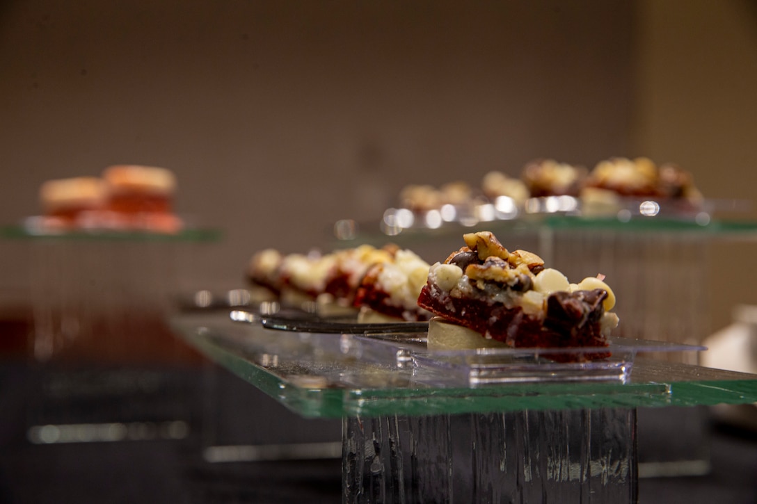Red velvet seven layer bars are placed on display at a reception before the Friday Evening Parade at Marine Barracks Washington, D.C., April 30, 2021. (U.S. Marine Corps photo by Lance Cpl. Tanner D. Lambert)