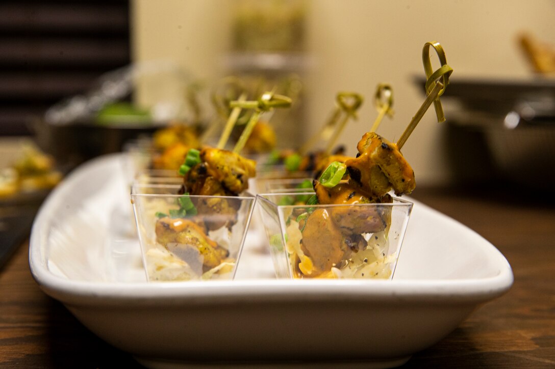 Chicken satays are placed on display at a reception before the Friday Evening Parade at Marine Barracks Washington, D.C., April 30, 2021.