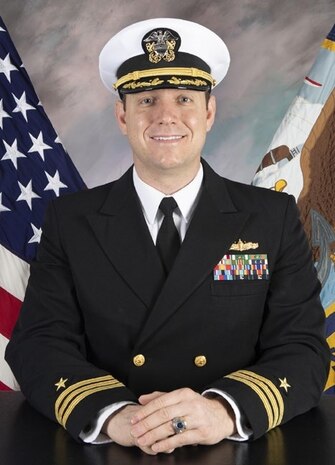 Studio portrait of Cmdr. Joshua P. Wolf