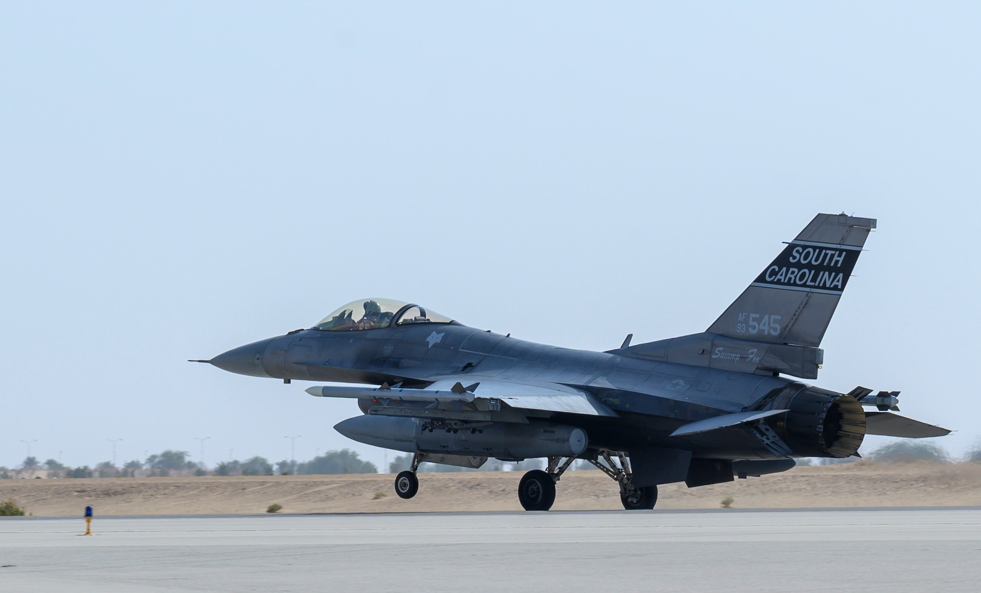 A U.S. Air Force F-16CJ Fighting Falcon from South Carolina Air National Guard’s 169th“Swamp Fox” Fighter Wing lands on the flight line at Prince Sultan Air Base, Kingdom of Saudi Arabia, April 14, 2021. The Swamp Fox team has been deployed to PSAB to help bolster the defensive capabilities against potential threats in the region. (U.S. Air Force Photo by Senior Airman Samuel Earick)