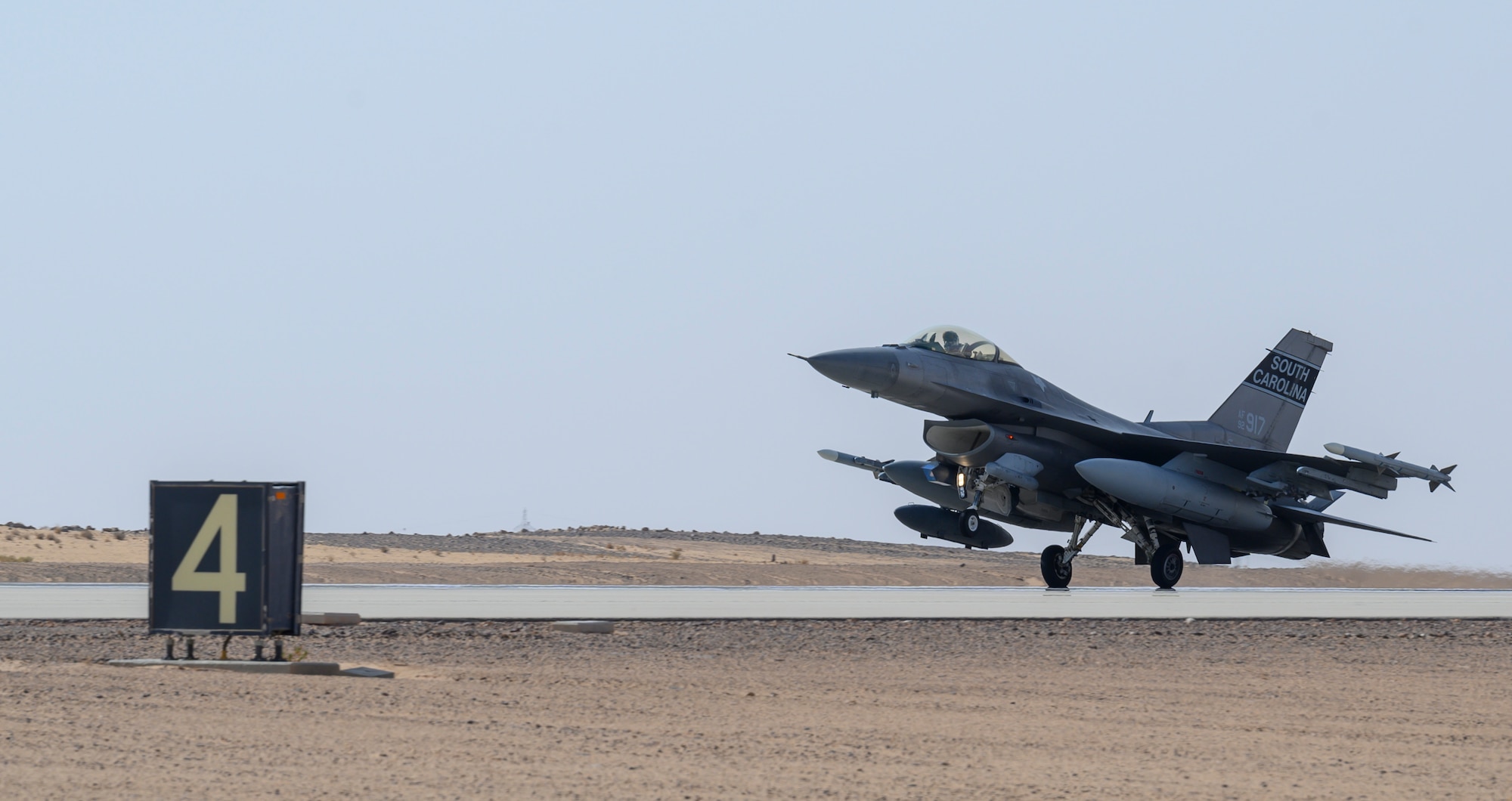 A U.S. Air Force F-16CJ Fighting Falcon from South Carolina Air National Guard’s 169th “Swamp Fox” Fighter Wing lands on the flight line at Prince Sultan Air Base, Kingdom of Saudi Arabia, April 14, 2021. The Swamp Fox team has been deployed to PSAB to help bolster the defensive capabilities against potential threats in the region. (U.S. Air Force Photo by Senior Airman Samuel Earick)