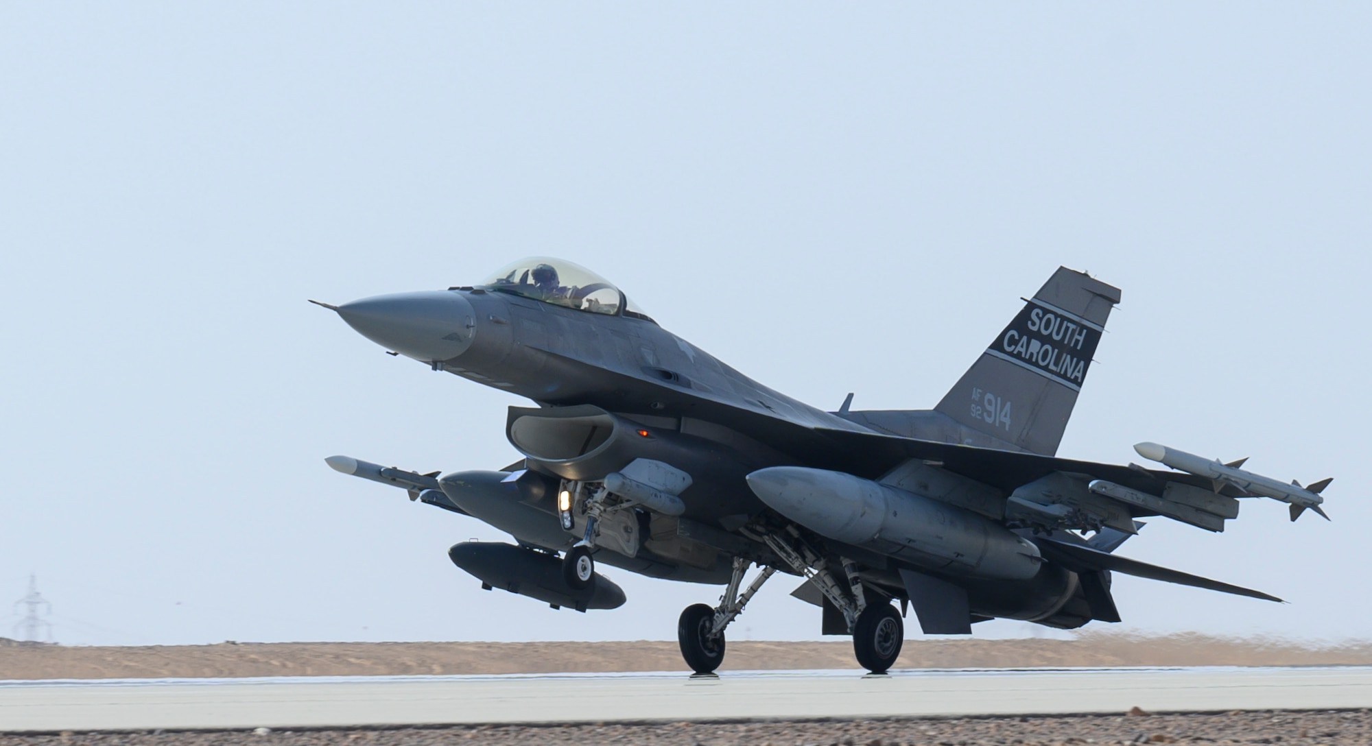 A U.S. Air Force F-16CJ Fighting Falcon from South Carolina Air National Guard’s 169th “Swamp Fox” Fighter Wing lands on the flight line at Prince Sultan Air Base, Kingdom of Saudi Arabia, April, 14, 2021. The Swamp Fox team has been deployed to PSAB to help bolster the defensive capabilities against potential threats in the region. (U.S. Air Force Photo by Senior Airman Samuel Earick)