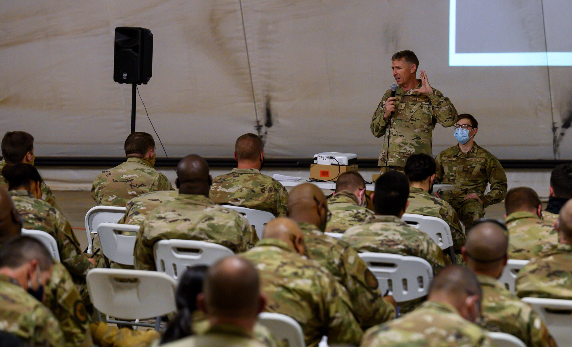 Brig. Gen. Evan Pettus, 378th Air Expeditionary Wing commander, welcomes new members of the wing at Prince Sultan Air Base, Kingdom of Saudi Arabia, April 12, 2021. Airmen from South Carolina Air National Guard’s 169th “Swamp Fox” Fighter Wing have been deployed to PSAB to help bolster the defensive capabilities against potential threats in the region. (U.S. Air Force Photo by Senior Airman Samuel Earick)