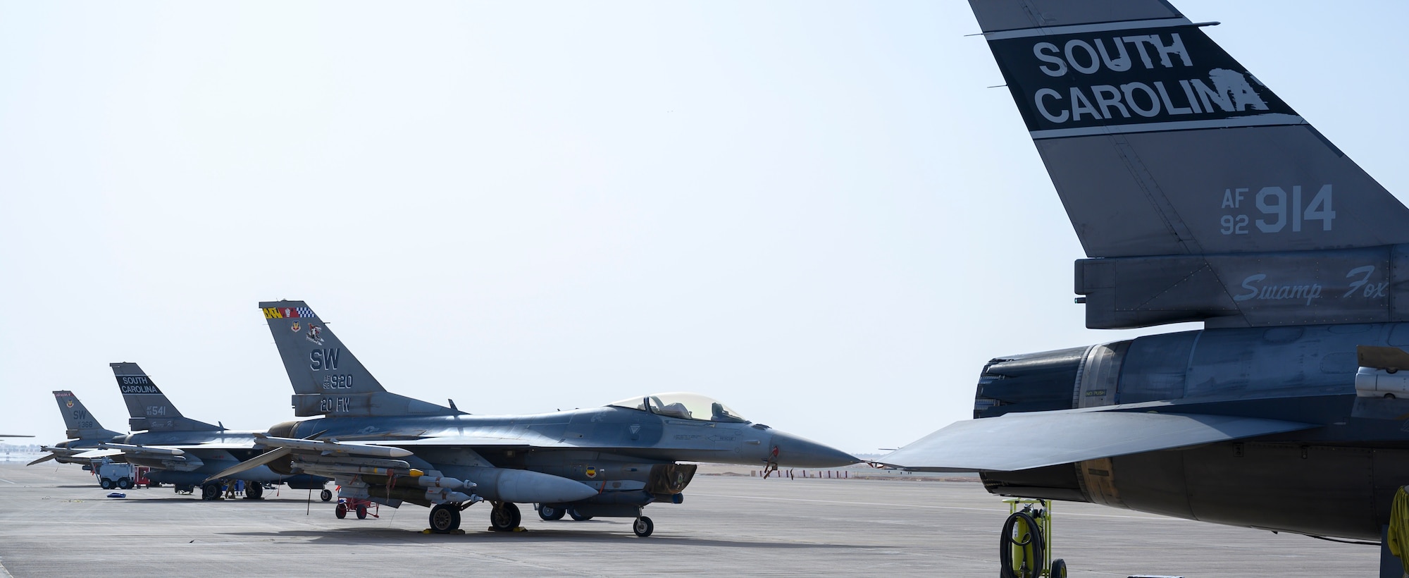 A contingent of U.S. Air Force F-16CJ Fighting Falcons sit on the flightline at Prince Sultan Air Base, Kingdom of Saudi Arabia, April 14, 2021. The 378th Air Expeditionary Wing is postured to accept and integrate follow-on forces to project decisive combat power in support of theater operations. (U.S. Air Force Photo by Senior Airman Samuel Earick)