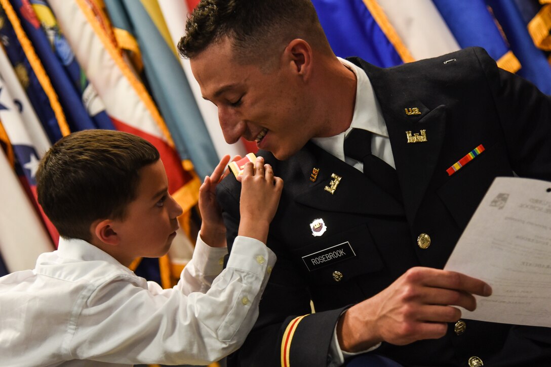 Nine Virginia Army National Guard officer candidates celebrate their graduation from Officer Candidate School April 25, 2021, at a ceremony held at Fort Pickett, Virginia. The candidates, all part of the winter accelerated Class 64A, took the oath of office and were then pinned with second lieutenant rank by family and friends. Col. Doyle Gillis, the Virginia National Guard’s director of manpower and personnel, served as the guest speaker. (U.S. Army National Guard photo by Sgt. 1st Class Terra C. Gatti)