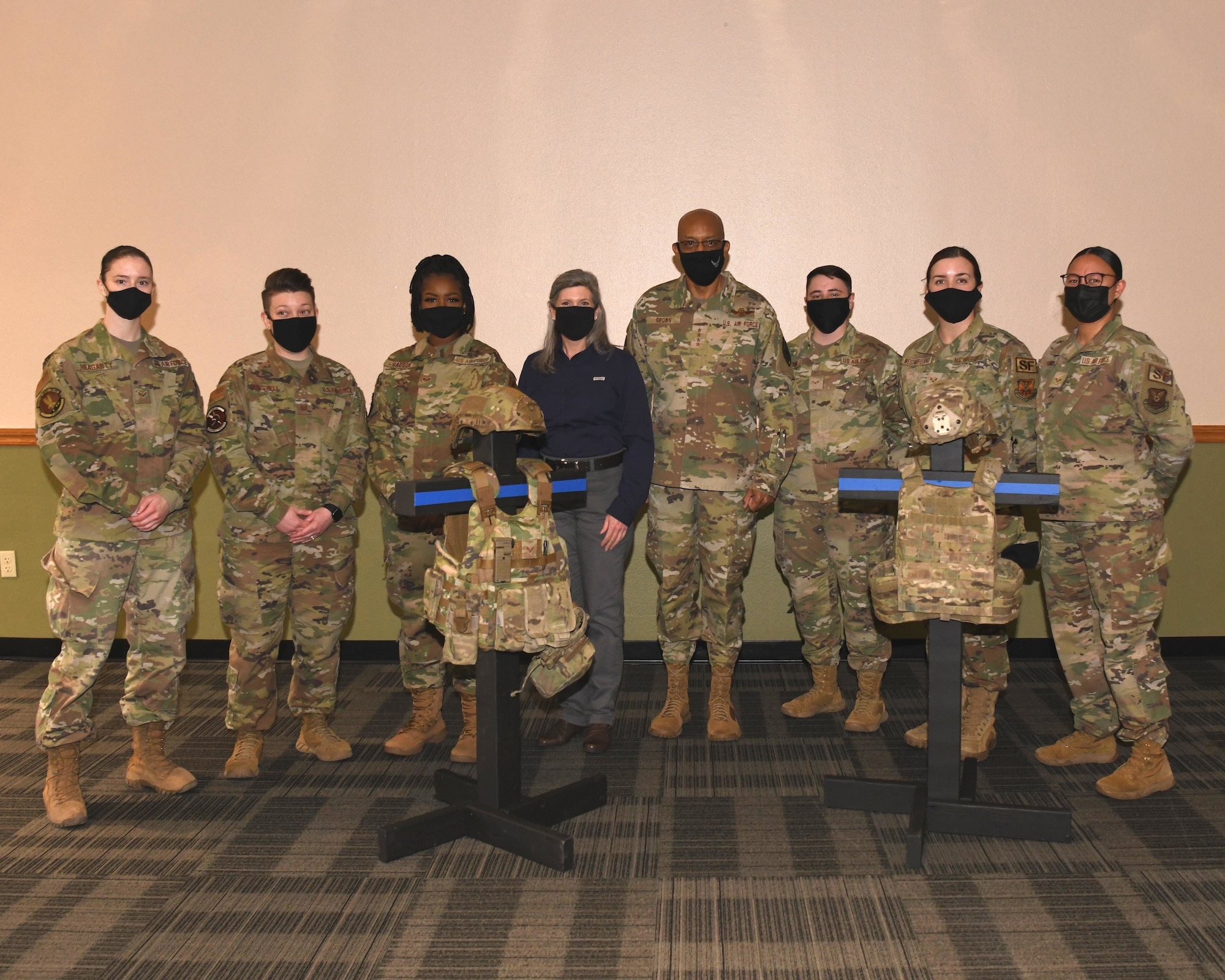 Members of a congressional delegation and Air Force Chief of Staff Gen. Charles Q. Brown, Jr. have lunch and discuss new female body armor on April 30, 2021, at Minot Air Force Base, North Dakota.  The new female body armor, part of the Air Force’s continued progress in innovation, is an improvement to the Airman’s quality of life and ability to complete their mission. (U.S. Air Force photo by Airman 1st Class Evan J. Lichtenhan)