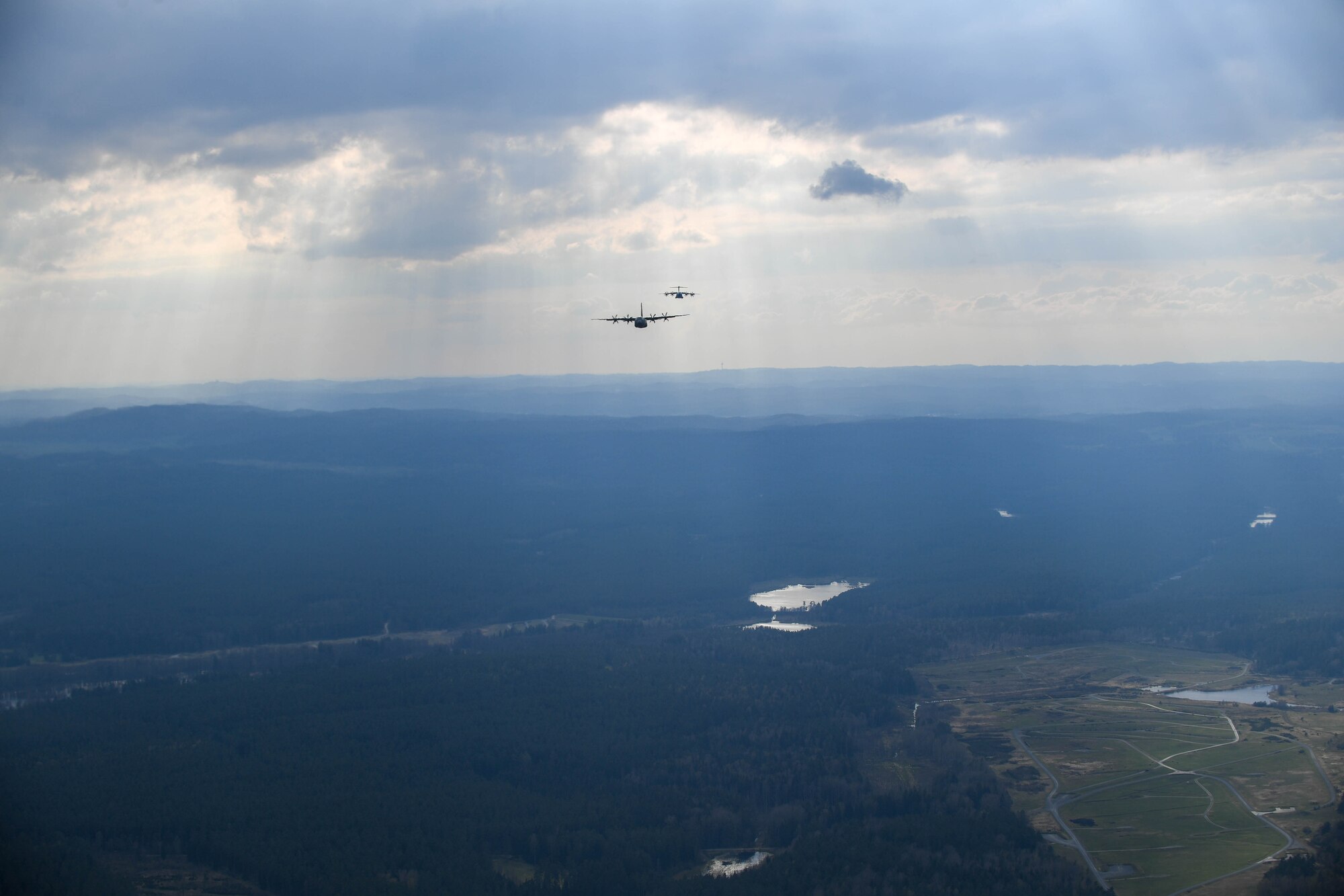 Two aircraft fly in the air