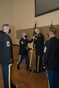 Soldiers pass colors