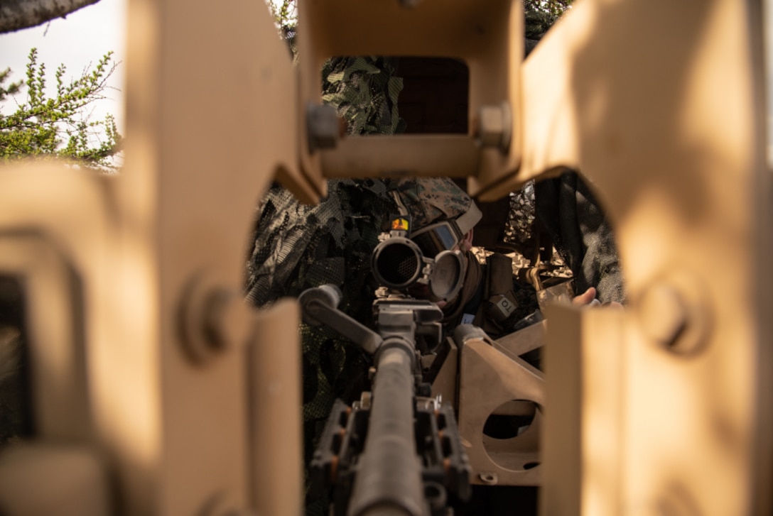 U.S. Marine Corps Cpl. Asgar Khan, an automotive maintenance technician with 3d Transportation Battalion, 3rd Marine Logistics Group, provides security during Artillery Relocation Training Program 21.1 at Combined Arms Training Center, Camp Fuji, Japan, April 22, 2021. The training contributes to the defense of Japan and the U.S.-Japan Alliance as the cornerstone of peace and security in the Indo-Pacific region. 3rd TB provides artillery Marines with diverse means of logistical support, contributing to a resilient, survivable force that is able to provide precision indirect fires inside an enemy threat ring. Khan is a native of Live Oak, California.