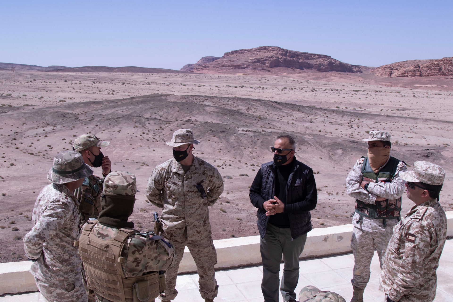 Maj. Josh Roberts discuss the training exercise between the SCT-J U.S. Marines and the Jordanian forces. The training exercise consisted of mortar teams, artillery teams and a Jordan Marine team working together toward a final live fire exercise.