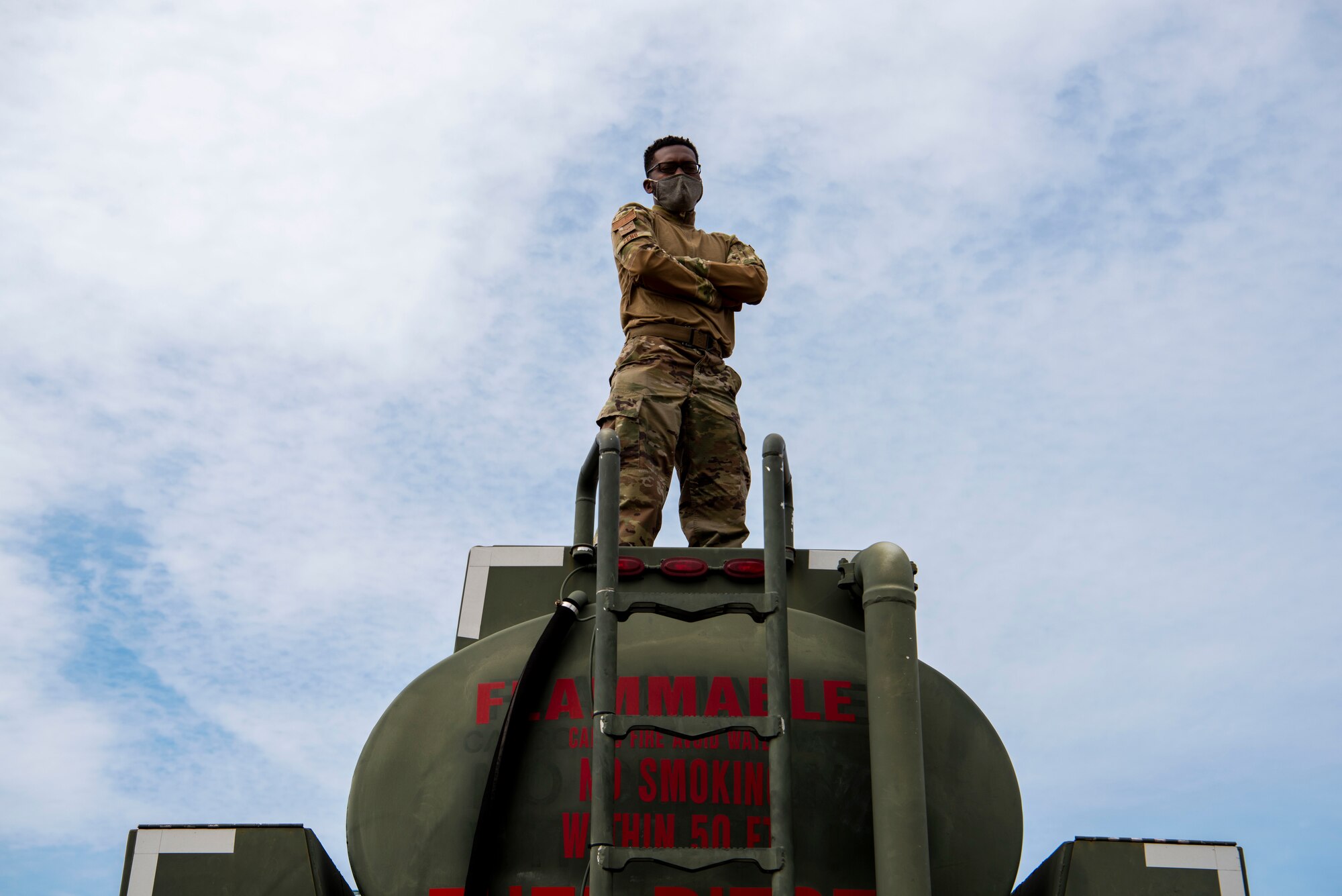Airman 1st Class Michael Zeno, 4th Logistics Readiness Squadron, a petroleum, oil and lubricants journeyman, stand on top of a C-300 fuel truck at Tyndall Air Force Base, Florida, May 1, 2021. POL is crucial to sustain aircraft and support ground forces.(U.S. Air Force photo by Airman Jordan Colvin)