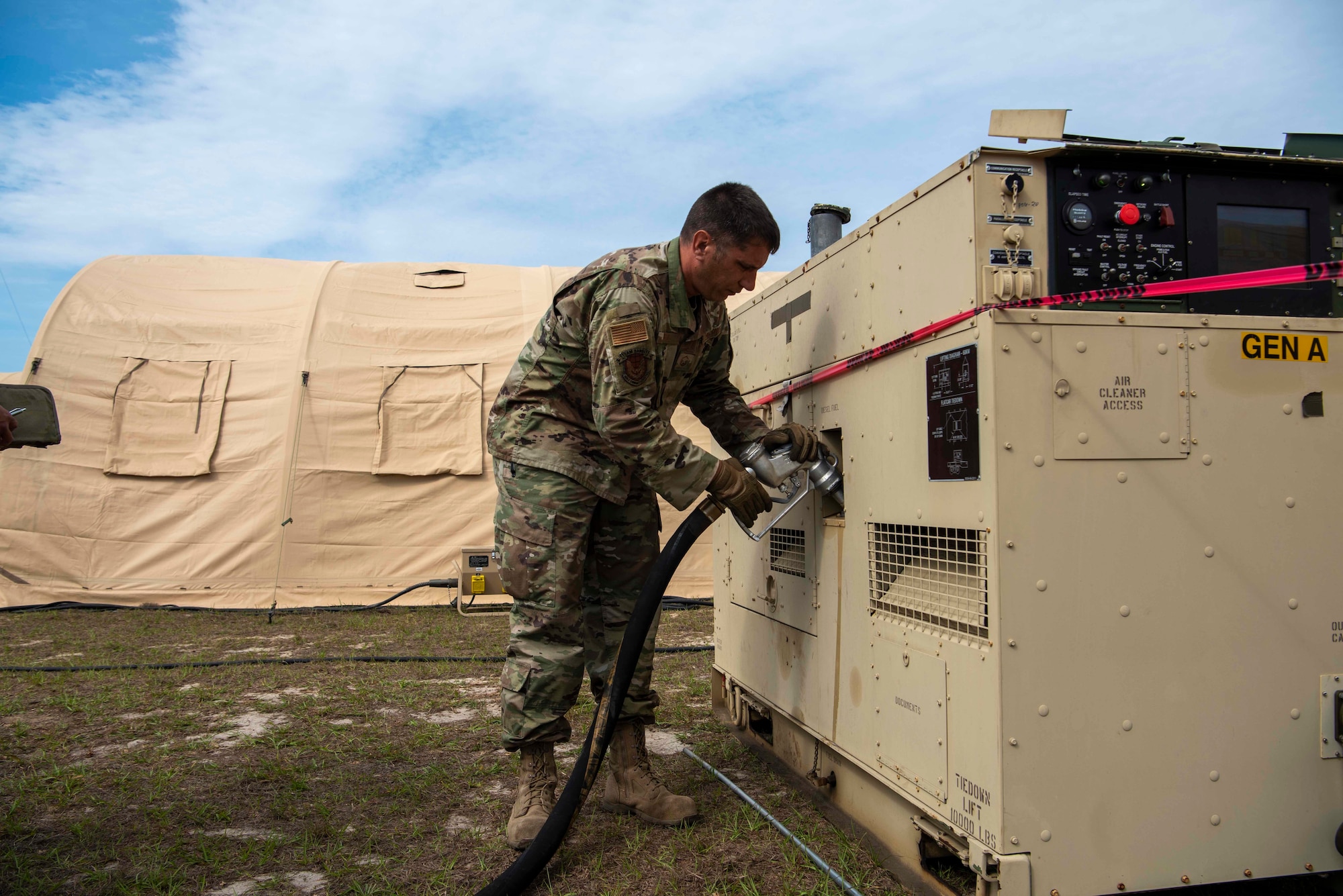 Master Sgt. Daniel Knez, 4th Logistics Readiness Squadron petroleum, oil and lubricants fuels a generator at Tyndall Air Force Base, Florida, May 1, 2021. POL is crucial to sustain aircraft and support ground forces. (U.S. Air Force photo by Airman Jordan Colvin)
