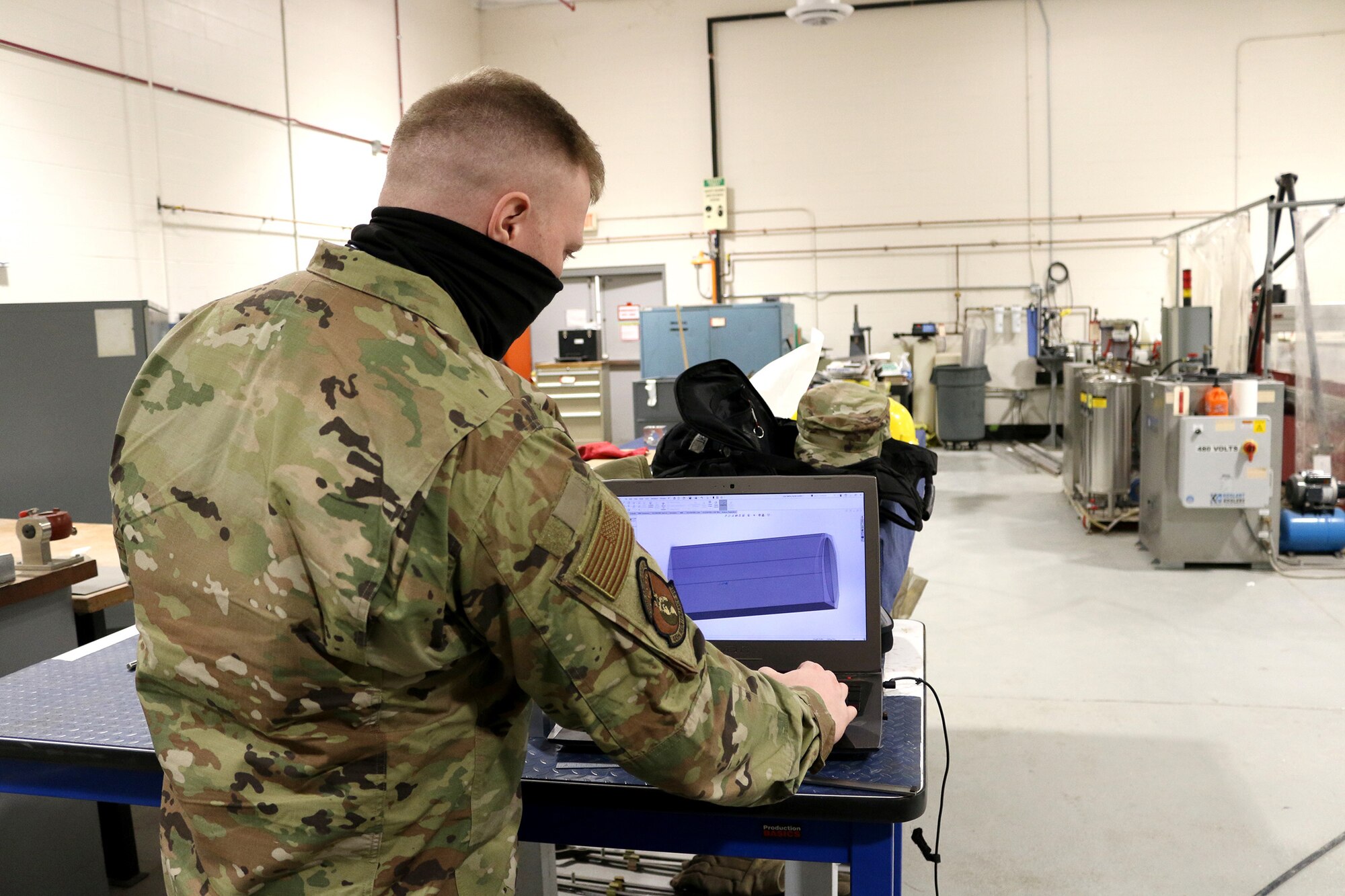 Senior Airman Nicholas Wright, 445th Maintenance Squadron metals technologist, uses software and measuring tools to digitally recreate and produce physical products. The software he is using, Computer Aided Drafting (CAD), allows him to create an accurate three dimensional blueprint which can then be crafted by automated manufacturing machines. (U.S. Air Force photo/ Tech. Sgt. Joel McCullough)