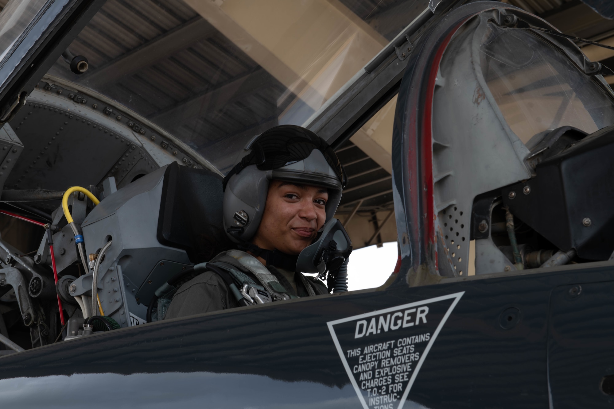 U.S. Air Force Staff Sgt. Alana Mullins, a 509th Operations Support Squadron radar, airfield, and weather systems technician, prepares for a flight in the T-38 Talon at Whiteman Air Force Base, Missouri, April 28, 2021. T-38 familiarization flights give non-flying Airmen hands on experience with the airframes they support. (U.S. Air Force photo by Airman 1st Class Devan Halstead)