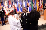 Second Lt. Abando A. Nkwanyou receives his lieutenant bars during a commissioning ceremony held April 29, 2018, at Fort Pickett, Virginia. (U.S. Army National Guard photo by Sgt. 1st Class Terra C. Gatti)