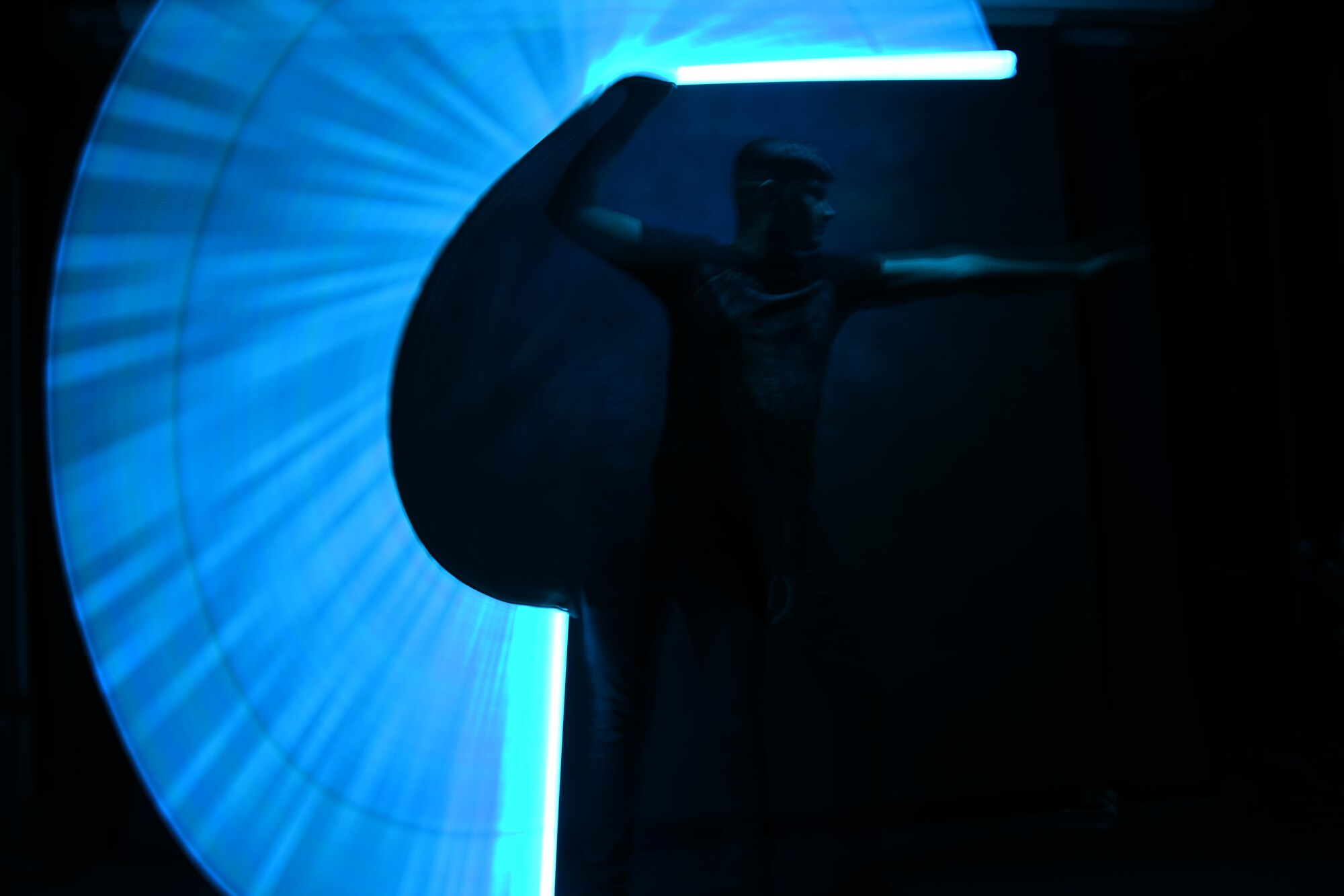 person with lightsaber