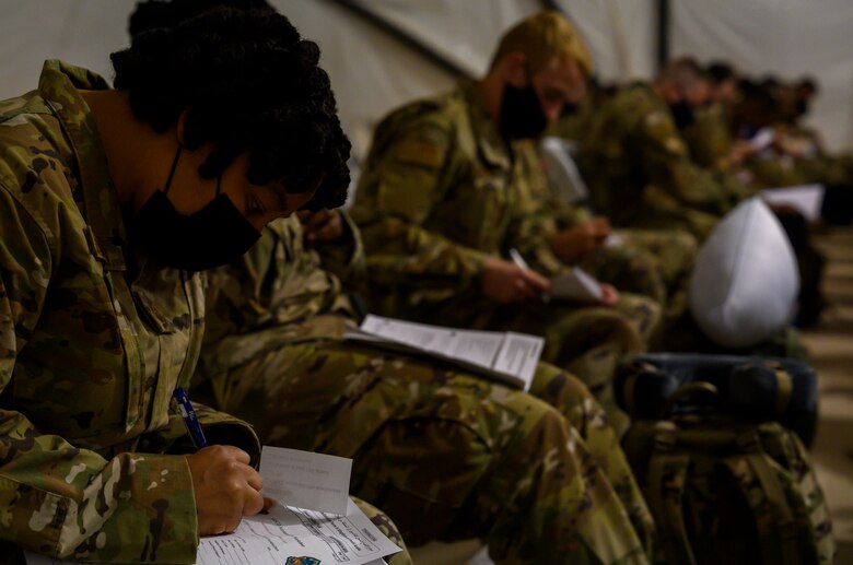 Airmen from South Carolina Air National Guard’s 169th “Swamp Fox” Fighter Wing in-process at Prince Sultan Air Base, Kingdom of Saudi Arabia, April 12, 2021. The Swamp Fox team has been deployed to PSAB to help bolster the defensive capabilities against potential threats in the region. (U.S. Air Force Photo by Senior Airman Samuel Earick)