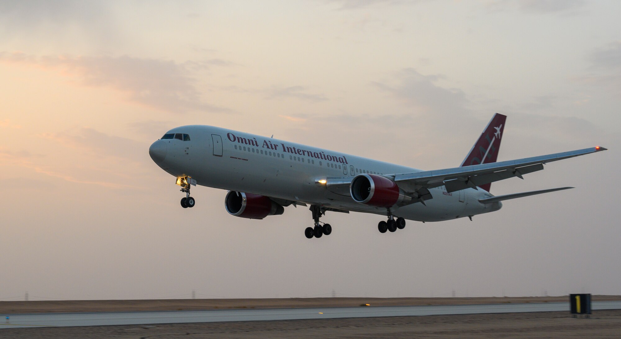 An aircraft carrying members of South Carolina Air National Guard’s 169th “Swamp Fox” Fighter Wing lands at Prince Sultan Air Base, Kingdom of Saudi Arabia, April 12, 2021. The Swamp Fox team has been deployed to PSAB to help bolster the defensive capabilities against potential threats in the region. (U.S. Air Force Photo by Senior Airman Samuel Earick)