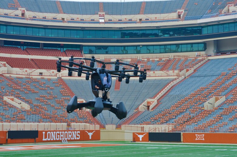LIFT Aircraft’s “Hexa” electric vertical takeoff and landing aircraft flies into the University of Texas at Austin football stadium for a live demonstration of this AFWERX Agility Prime collaboration during the April 9 event. (Photo courtesy of Joint Requirements Oversight Council)